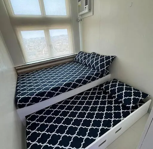 The Quin Place 1br 200mbps Wifi Apartment Manila